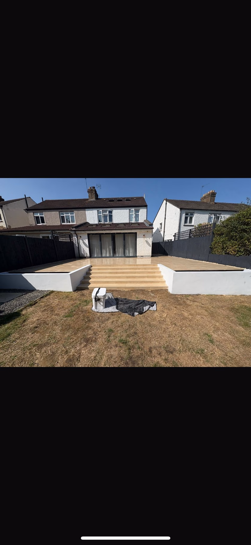 Raised porcelain patio with broad steps (2)