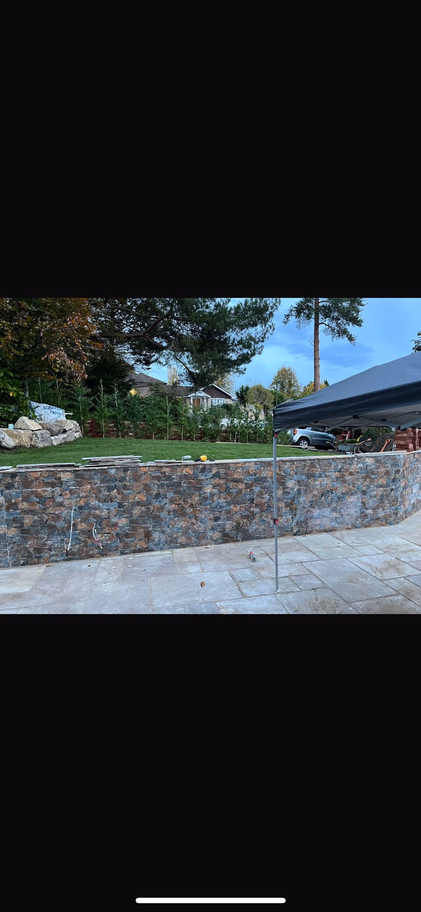 Lawn-led garden with boulder feature (2)